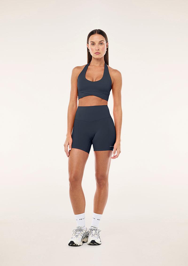 RESET HALTER SPORTS BRA IN MARINE BLUE by P.E NATION