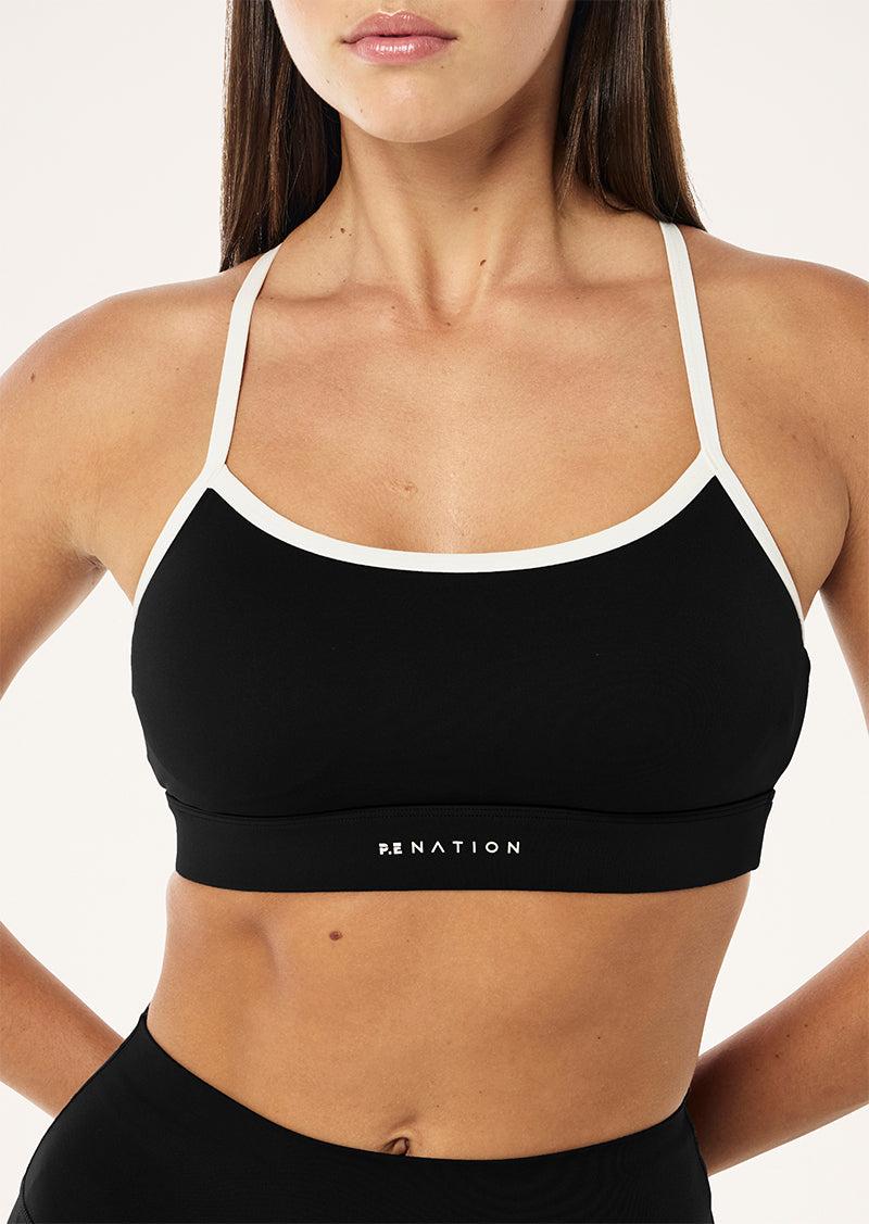 SIGNATURE SPORTS BRA IN BLACK & OPTIC WHITE by P.E NATION