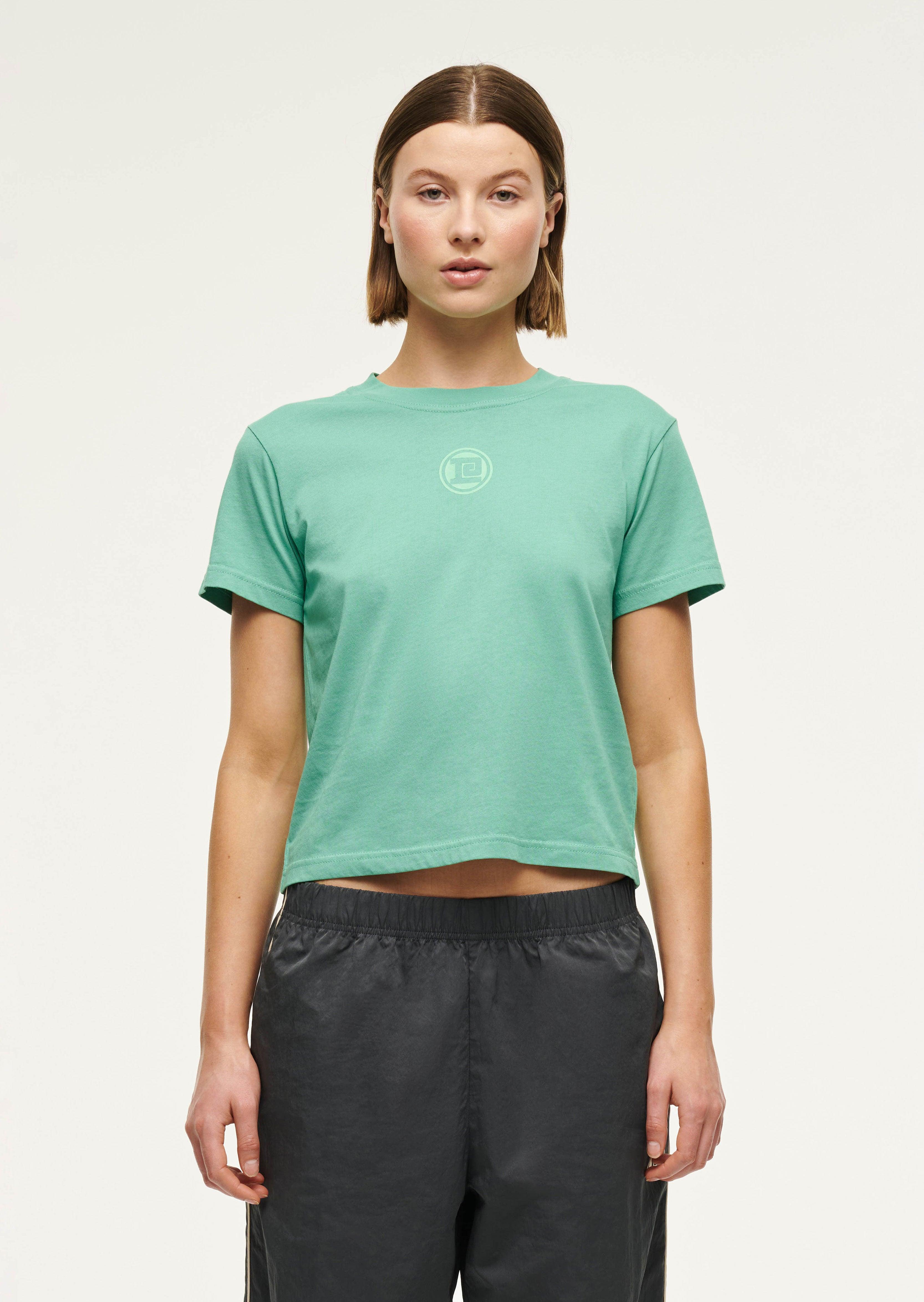 SPORTIVE SHORT SLEEVE TEE IN WASHED EVERGREEN by P.E NATION