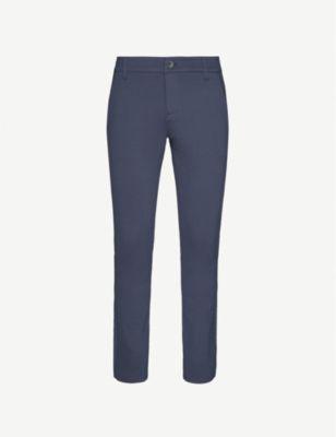 Stafford slim-fit tapered stretch-jersey trousers by PAIGE