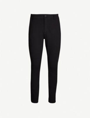 Transcend Knit Stafford Tapered Trousers by PAIGE