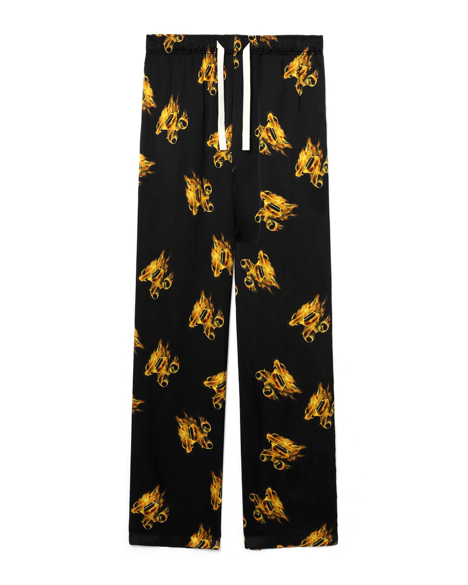 Burning monogram loose pants by PALM ANGELS