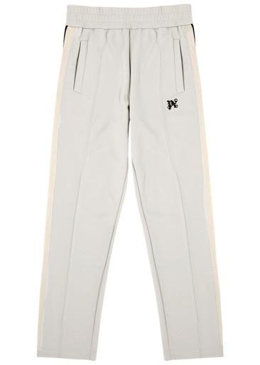 Logo striped jersey track pants by PALM ANGELS