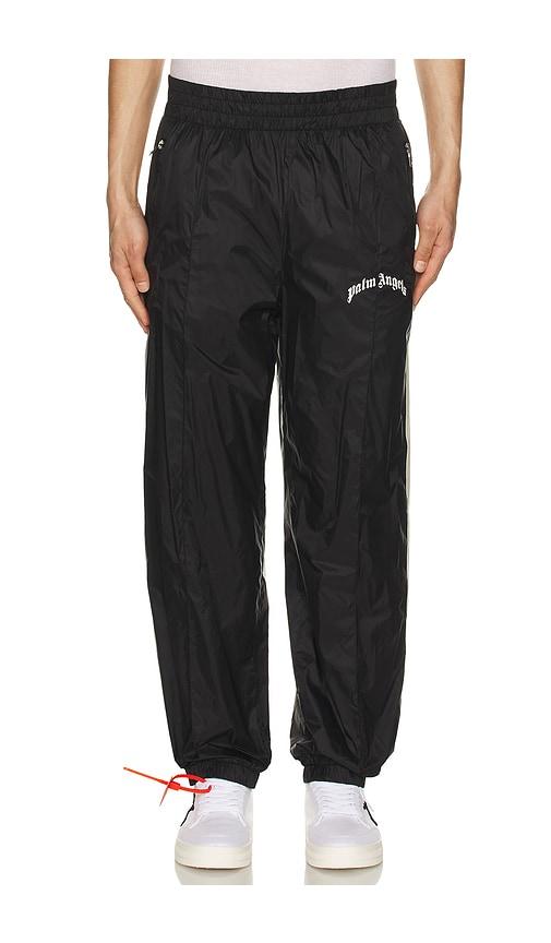 Palm Angels Curved Logo Nylon Track Pants in Black by PALM ANGELS