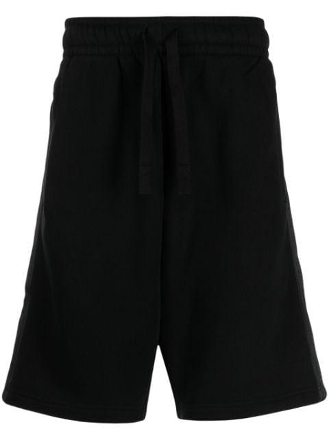 logo-tape cotton track shorts by PALM ANGELS