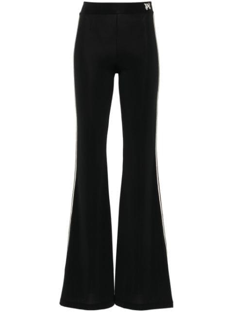 monogram-embroidered flared trousers by PALM ANGELS