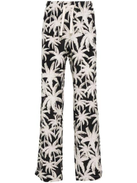 palm-tree print loose trousers by PALM ANGELS