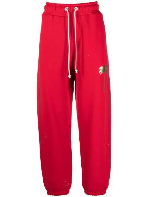 palm tree-print track pants by PALM ANGELS
