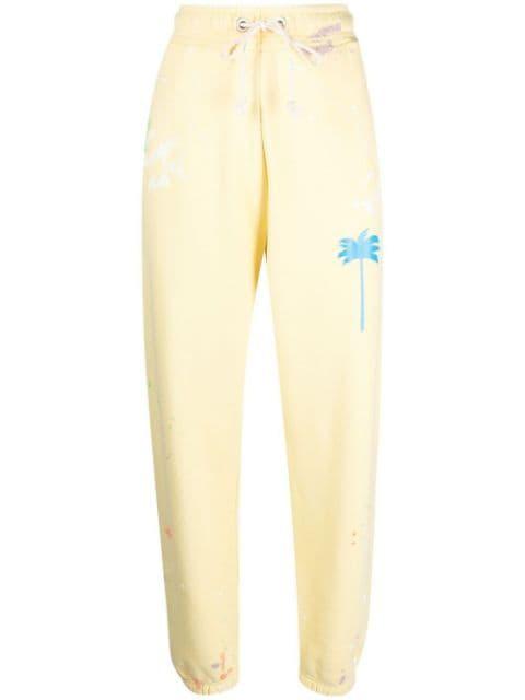 palm-tree print track pants by PALM ANGELS
