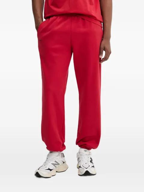 logo-print cuffed track pants by PANGAIA