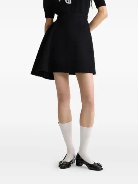 asymmetric tweed skirt by PATOU