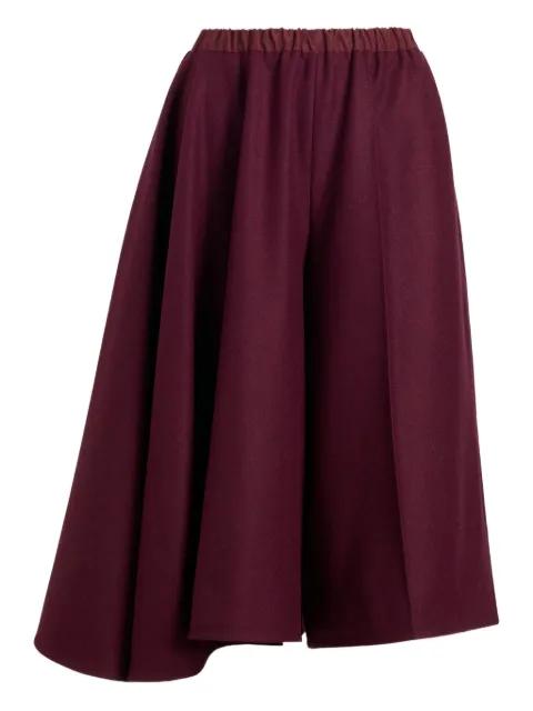 asymmetric wool shorts by PATOU