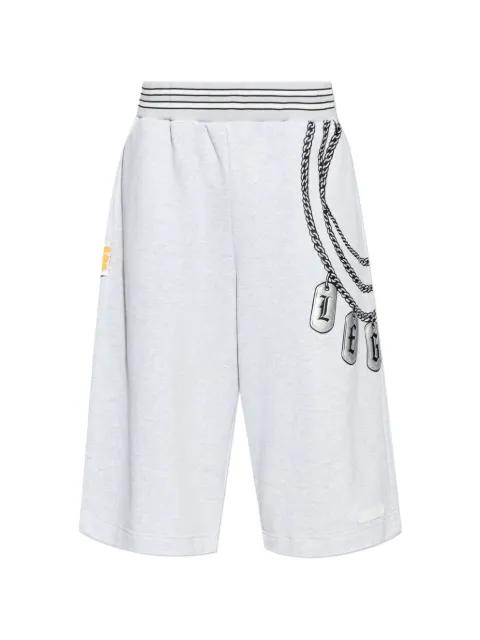 chain-print trousers by PDF