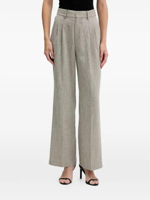 pleated trousers by PEDRO DEL HIERRO