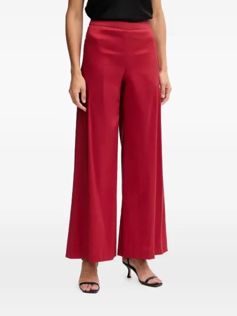 red palazzo pants by PEDRO DEL HIERRO