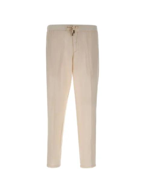 drawstring elasticated-waistband tapered trousers by PERFECTION