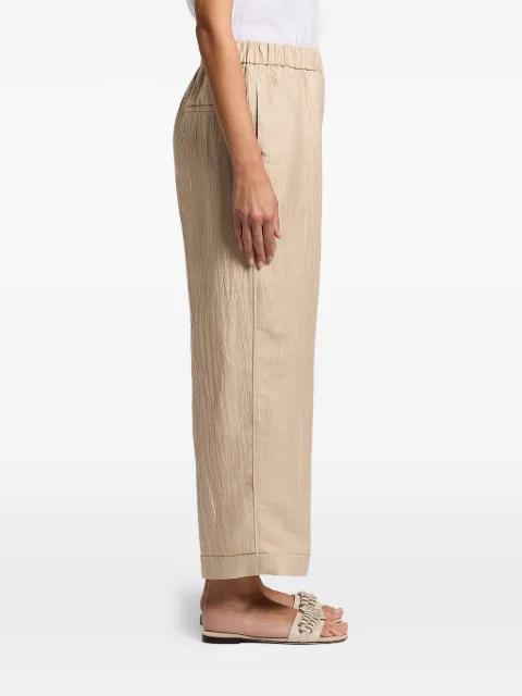 wet-effect trousers by PESERICO