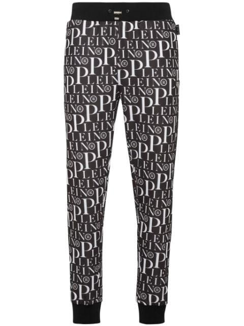 all-over logo-print track pants by PHILIPP PLEIN