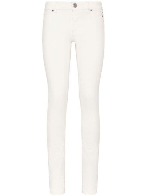 logo-buttoned jeggings by PHILIPP PLEIN