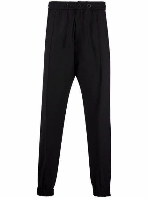 skull-motif rhinestone track trousers by PHILIPP PLEIN