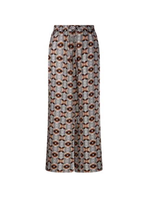 Aloe patterned drawstring trousers by PIERRE-LOUIS MASCIA