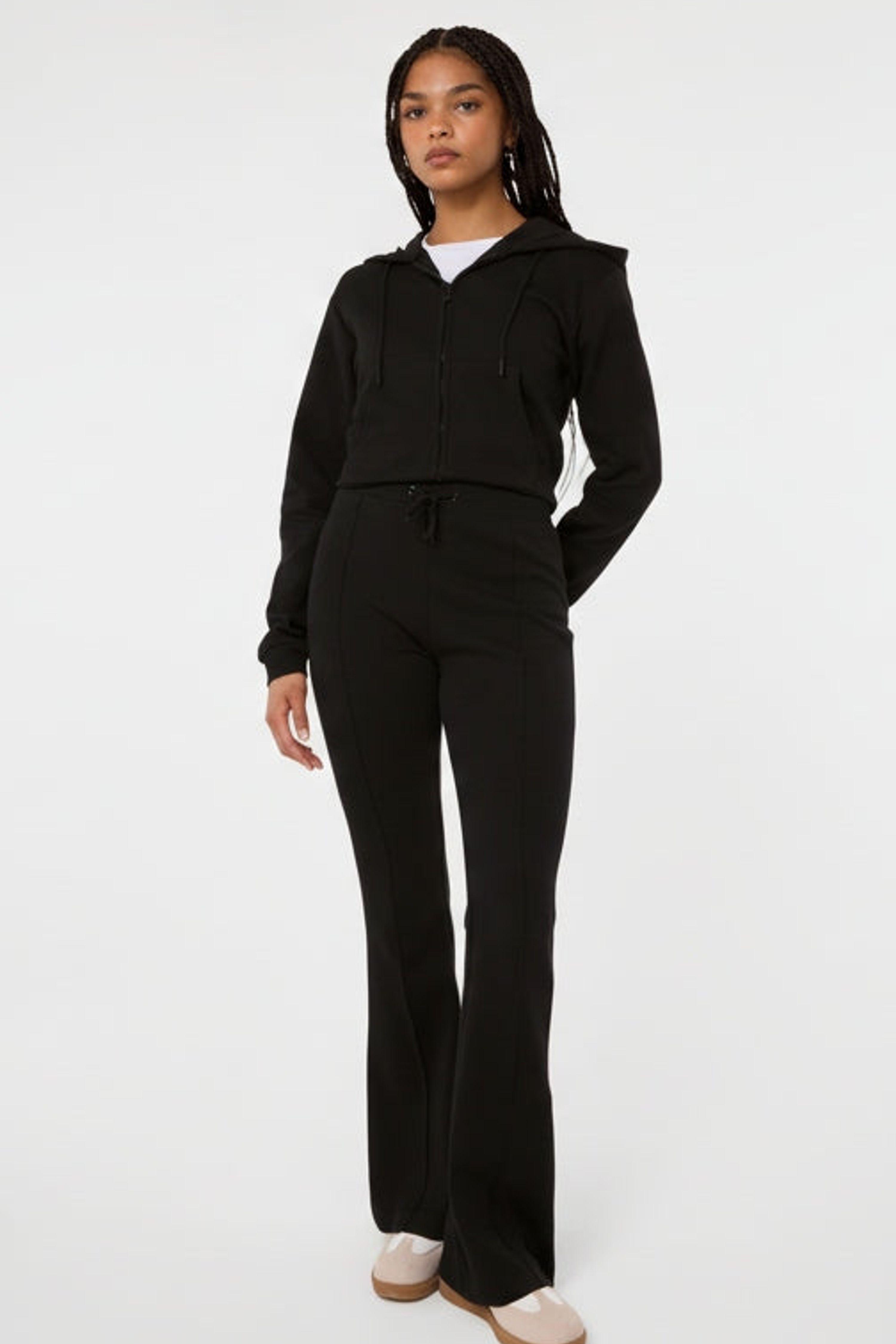 Black Pin Tuck Jersey Flares by PINK VANILLA