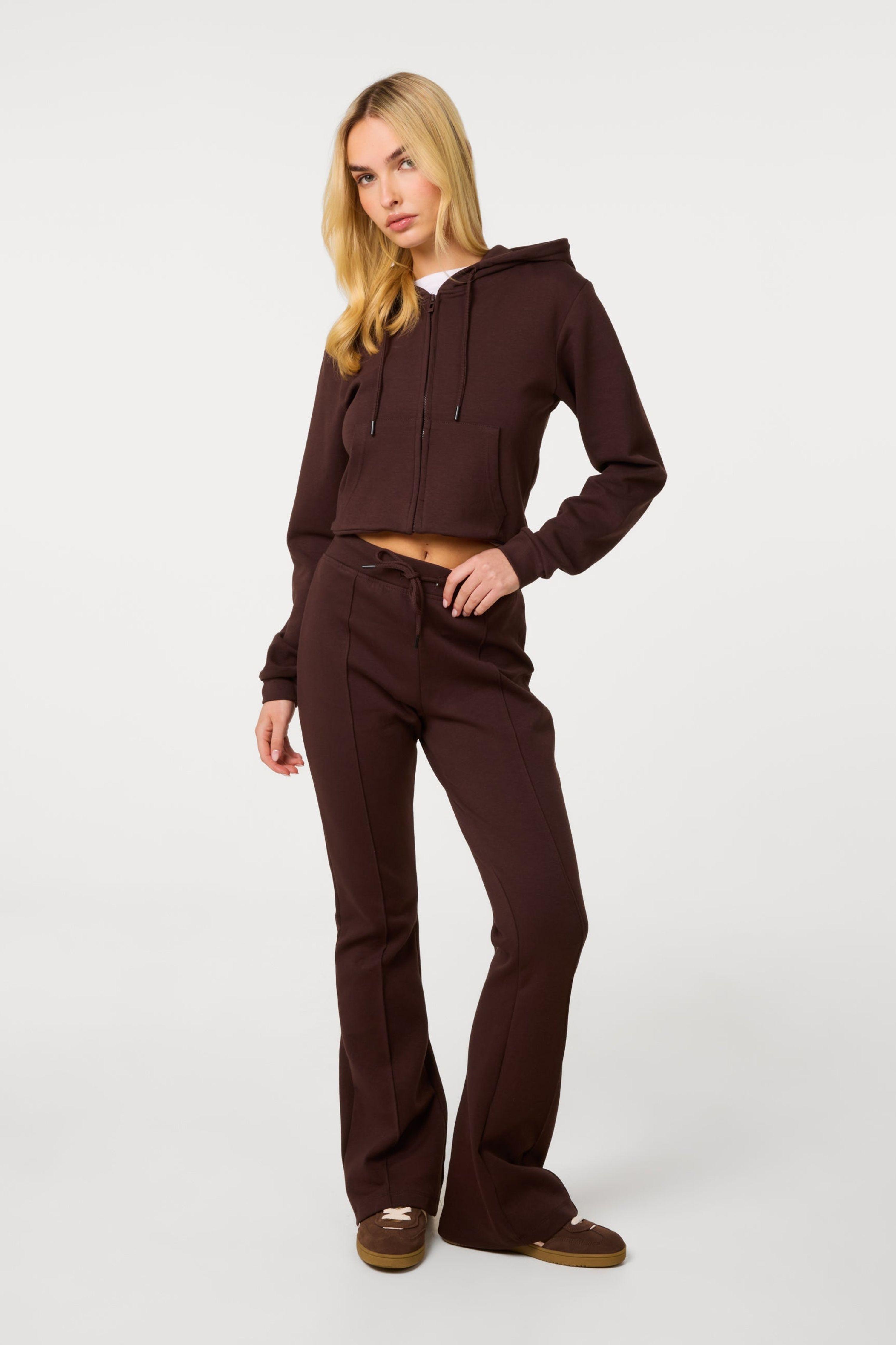 Brown Pin Tuck Jersey Flares by PINK VANILLA
