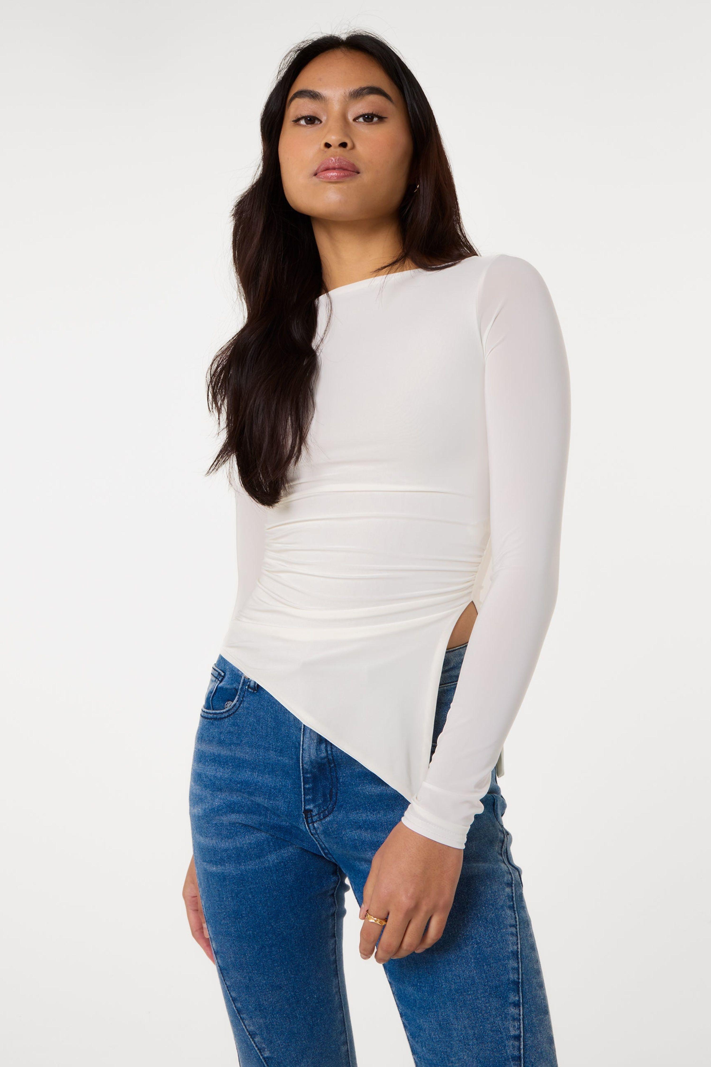 Ivory Long Sleeve Asymmetric Top by PINK VANILLA