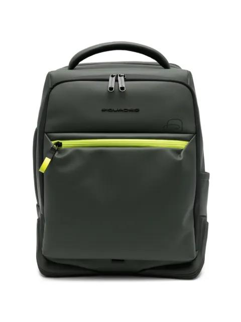green backpack by PIQUADRO