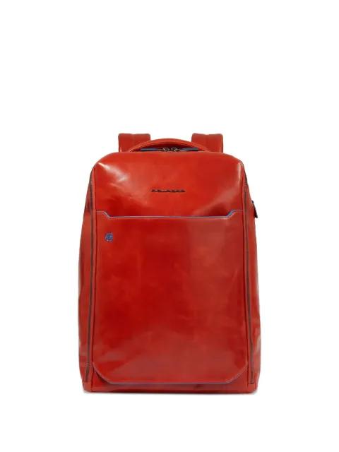 leather laptop backpack by PIQUADRO