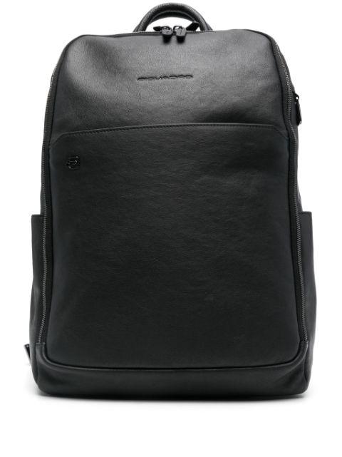 leather laptop backpack by PIQUADRO