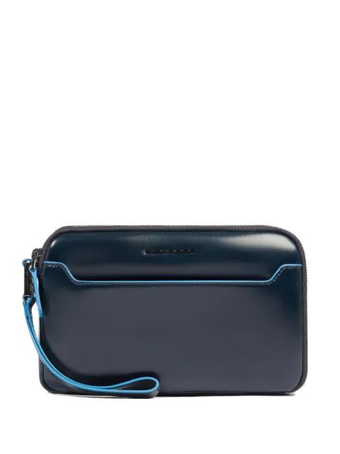 leather wrist-strap clutch bag by PIQUADRO