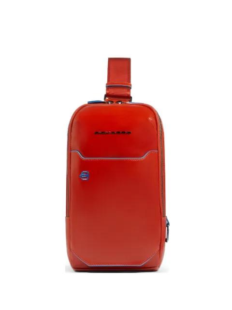 personalizable leather crossbody bag by PIQUADRO