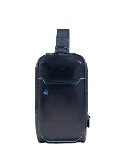 personalizable leather sling bag by PIQUADRO