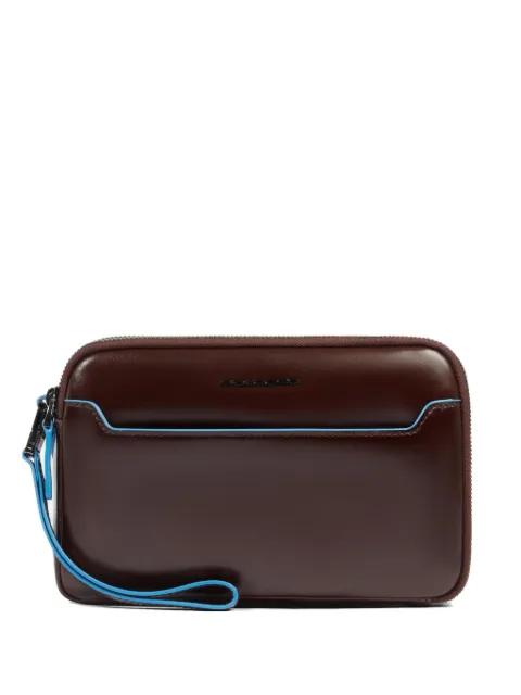 wrist-strap leather clutch by PIQUADRO