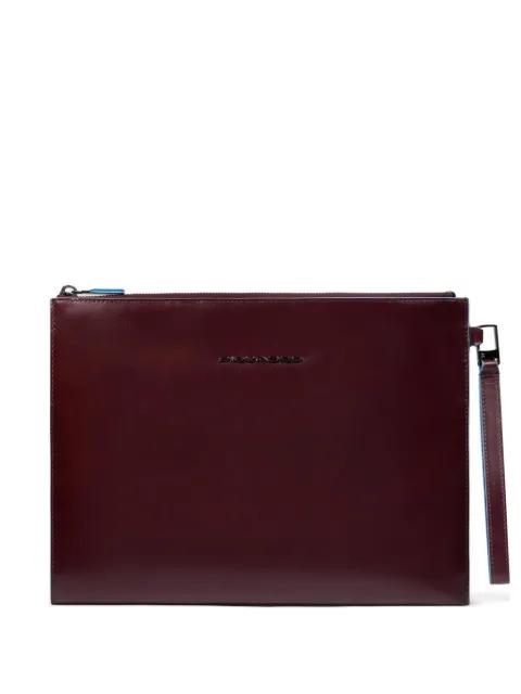 zipped clutch bag by PIQUADRO