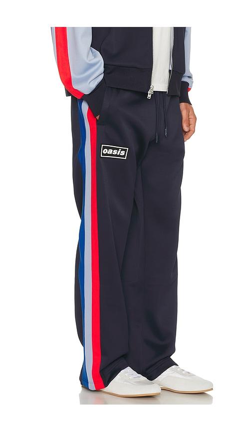 Pleasures x Oasis Forever Track Pants in Navy by PLEASURES