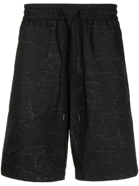 all-over logo print shorts by PORTS V