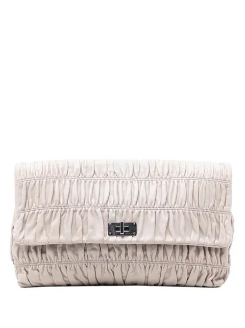 2013-2025 Nappa Gaufre Turn Lock clutch bag by PRADA 