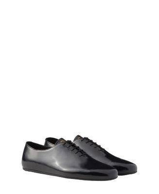 Brushed Leather Lace-Ups by PRADA