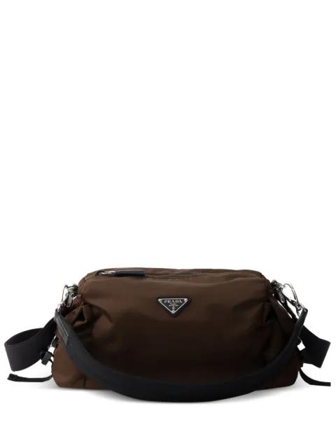 Explore Re-Nylon and leather bag by PRADA