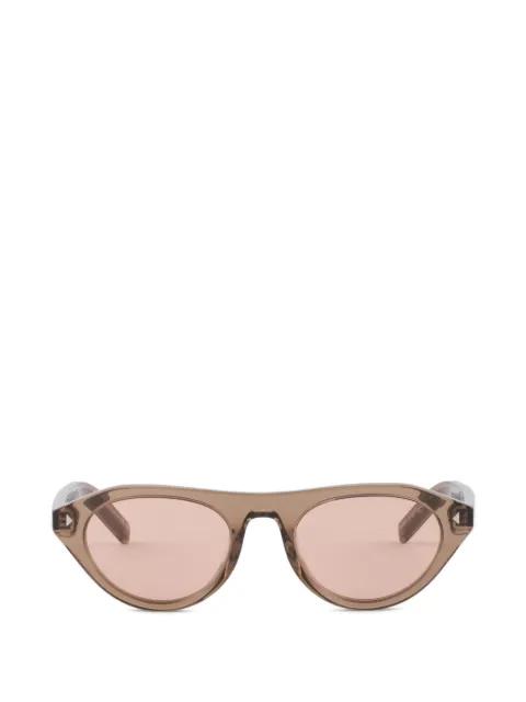 Prada sunglasses with the iconic metal plaque by PRADA
