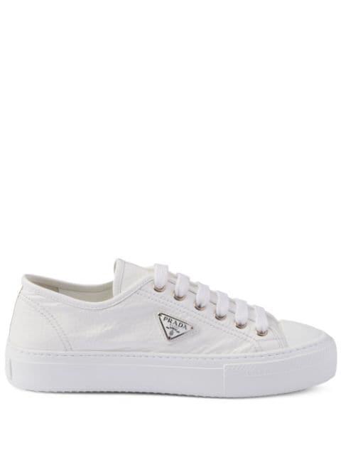 leather sneakers by PRADA