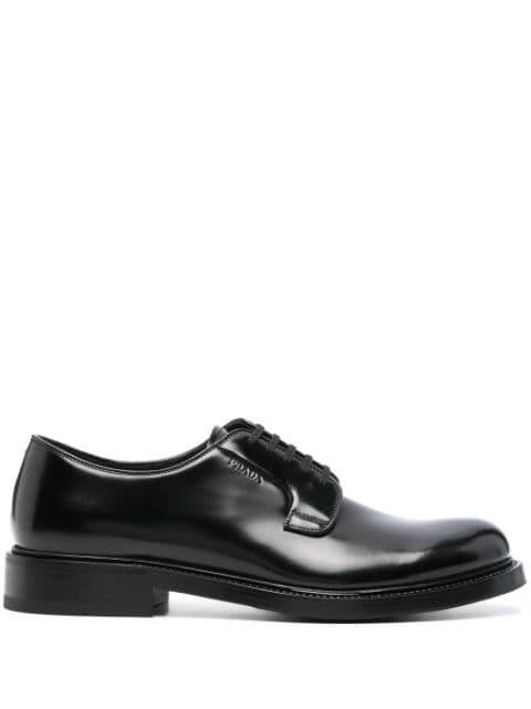 logo-debossed leather oxford shoes by PRADA
