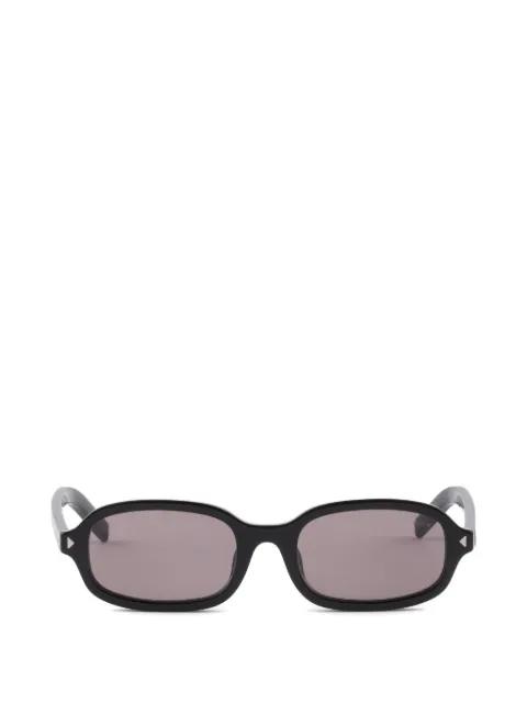 sunglasses with the iconic metal plaque by PRADA