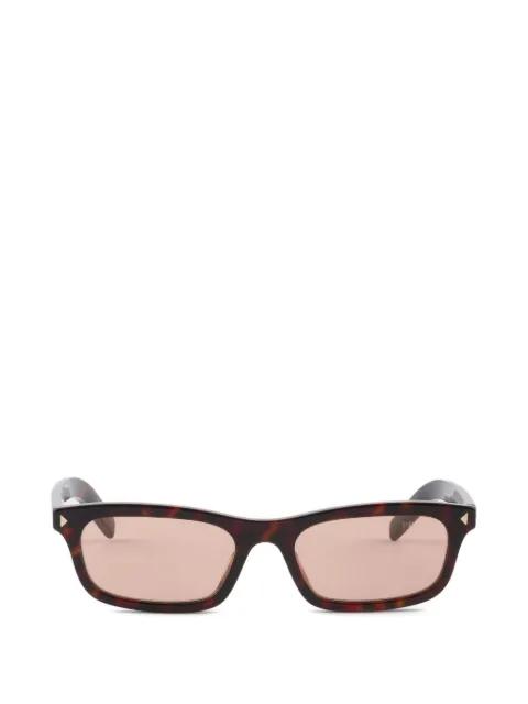 sunglasses with the iconic metal plaque by PRADA
