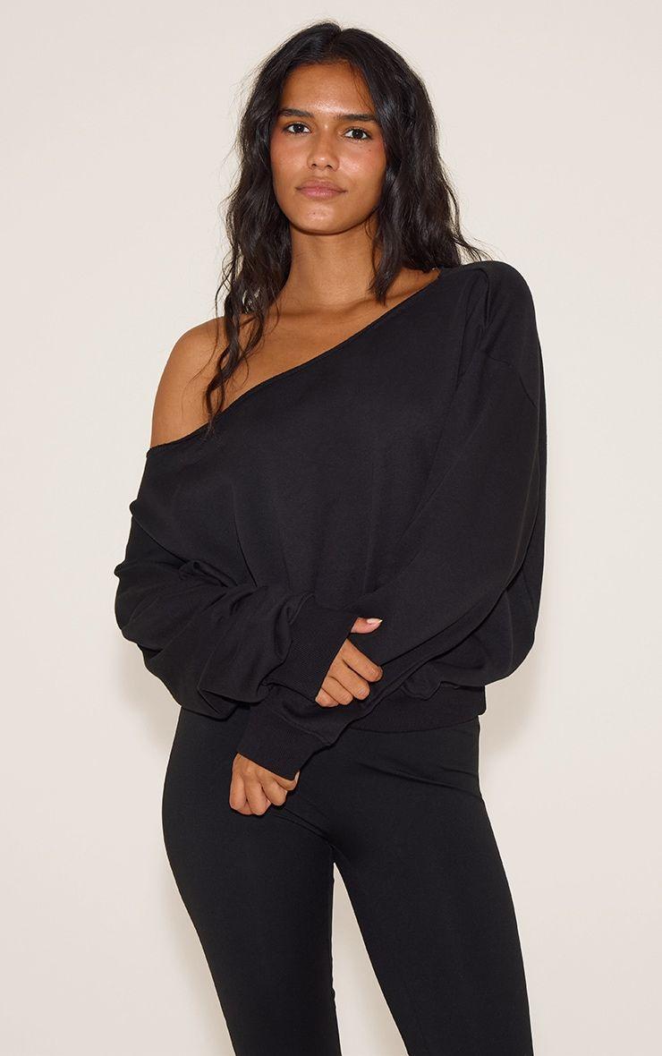 Black Oversized Off Shoulder Sweatshirt by PRETTYLITTLETHING