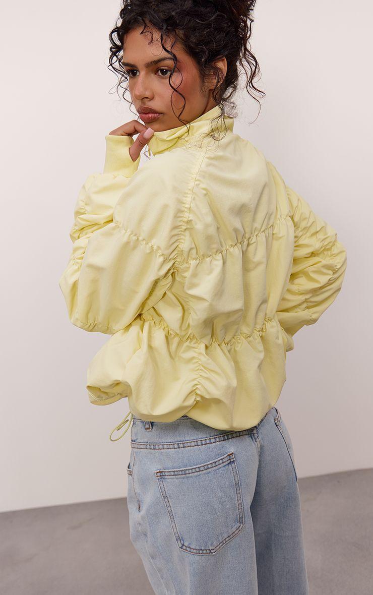 Buttercream Ruched  Zip Through Windbreaker by PRETTYLITTLETHING
