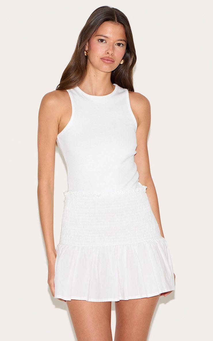 Cotton Shirred Drop Waist Mini Skirt by PRETTYLITTLETHING