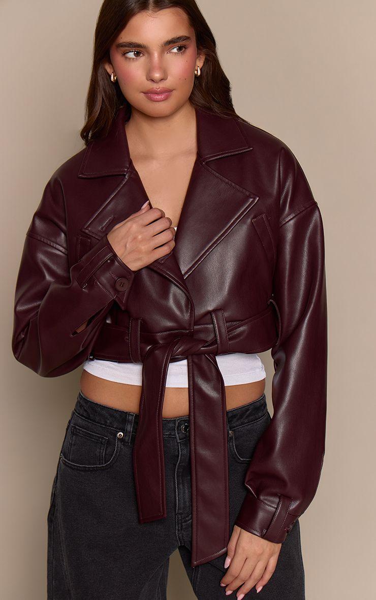 Oversized Belted Hem Cropped Biker Jacket by PRETTYLITTLETHING